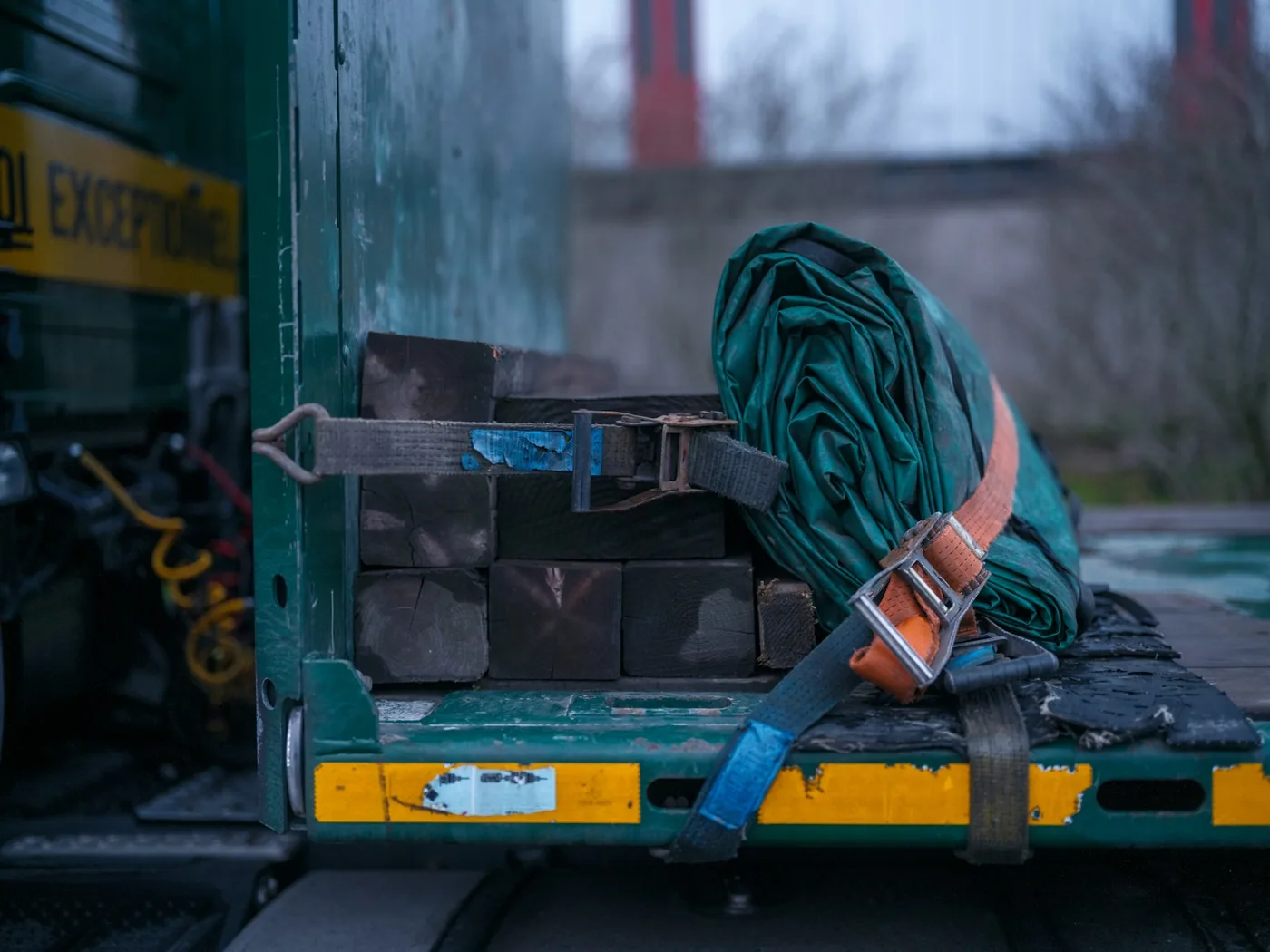 Cargo strapped down on the back of a truck