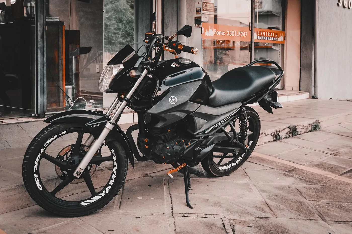 A small motorcycle parked on a street