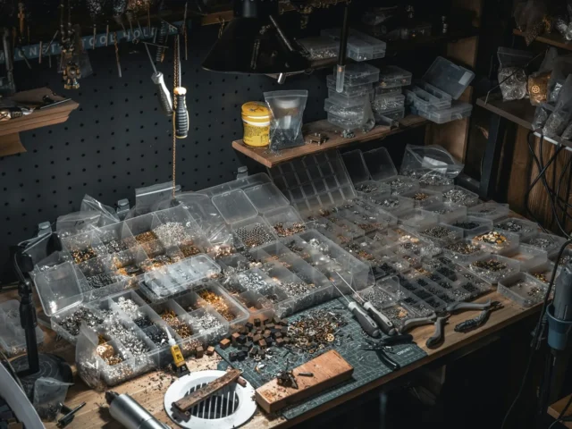 Motorcycle engine components laid out on a bench