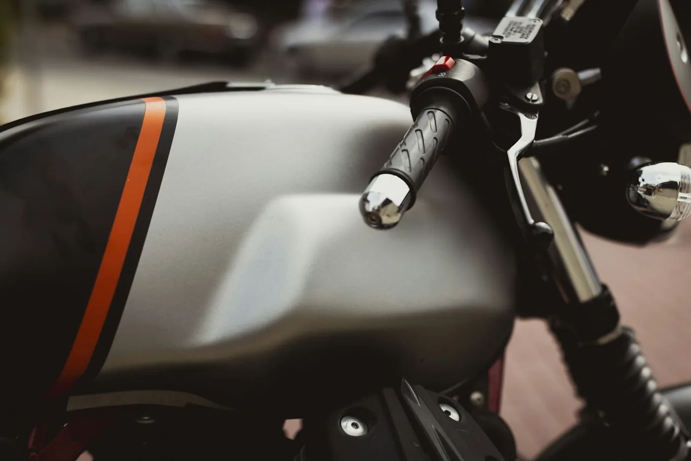 a close up of a motorcycle parked on a street
