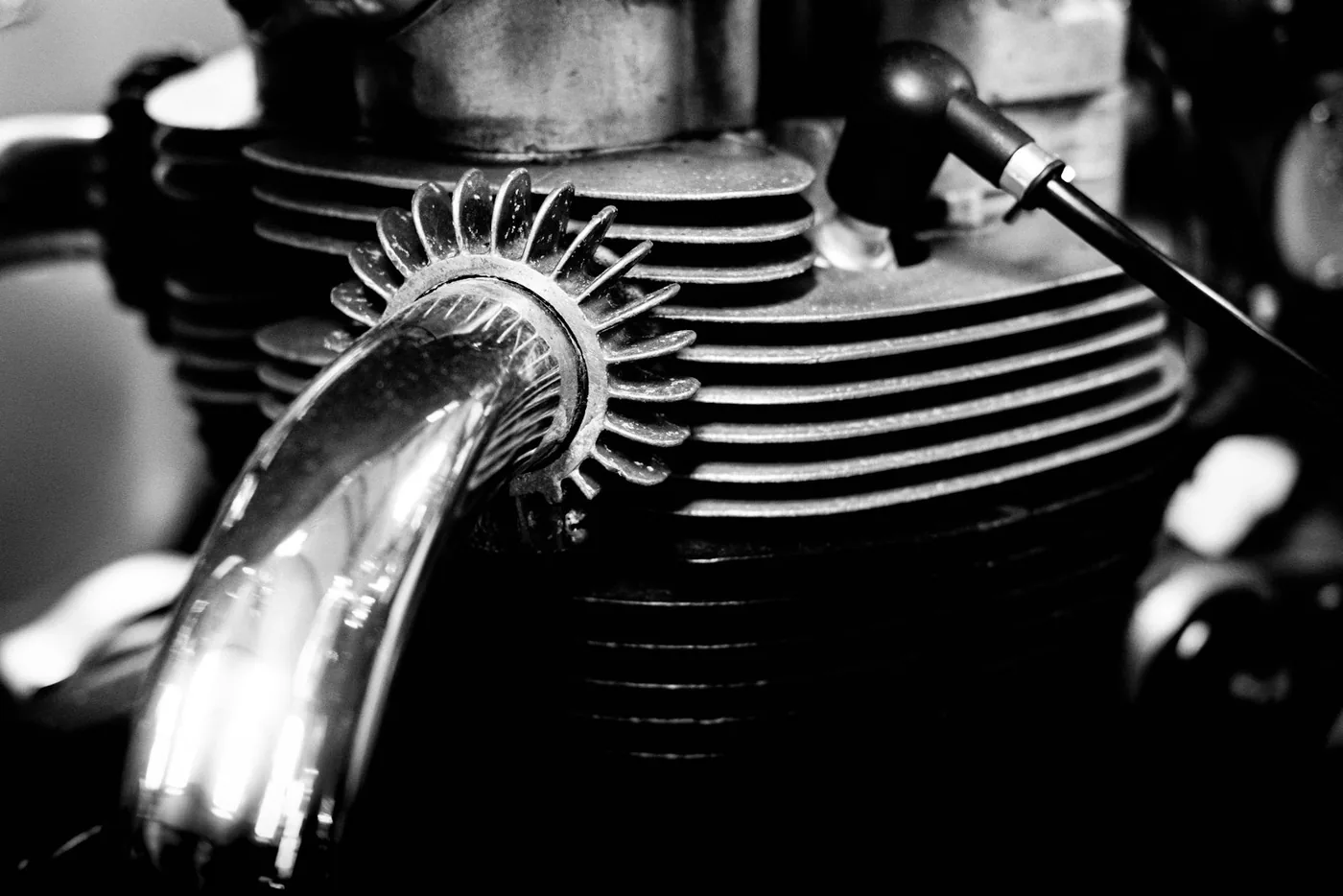 A finned engine barrel with its exhaust header