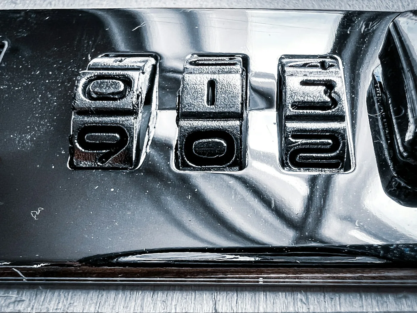 A serial number stamped into a metal surface