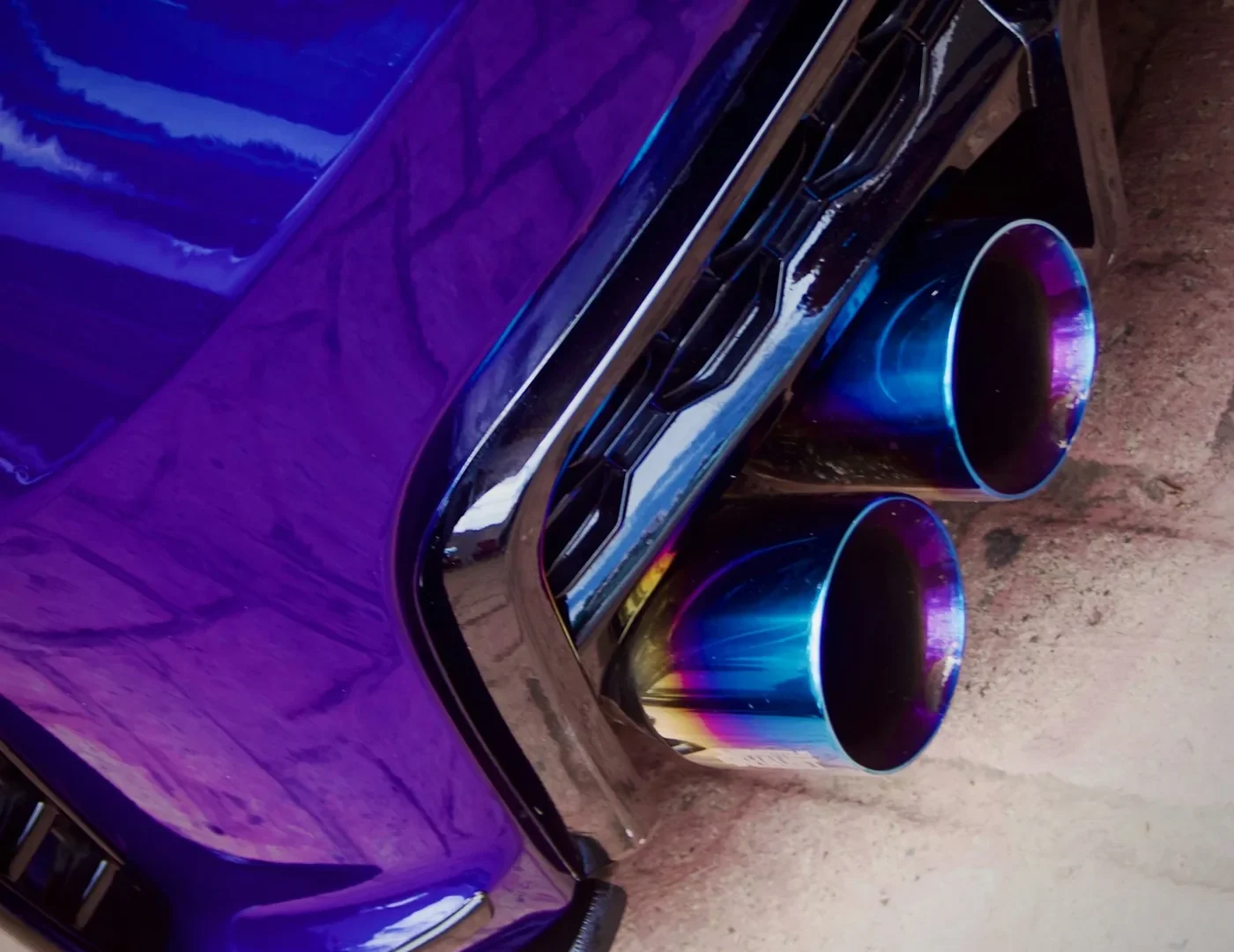 Close-up of a car's dual exhaust pipes