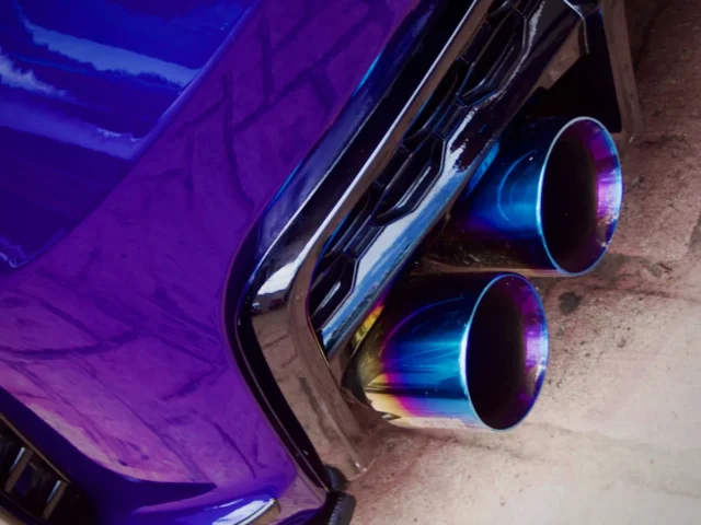 Close-up of a car's dual exhaust pipes