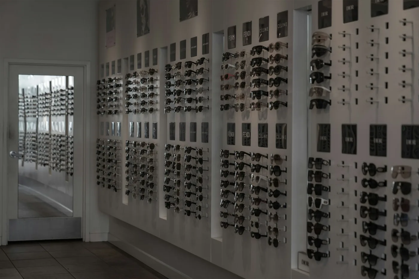 Wall display of sunglasses in an optical shop