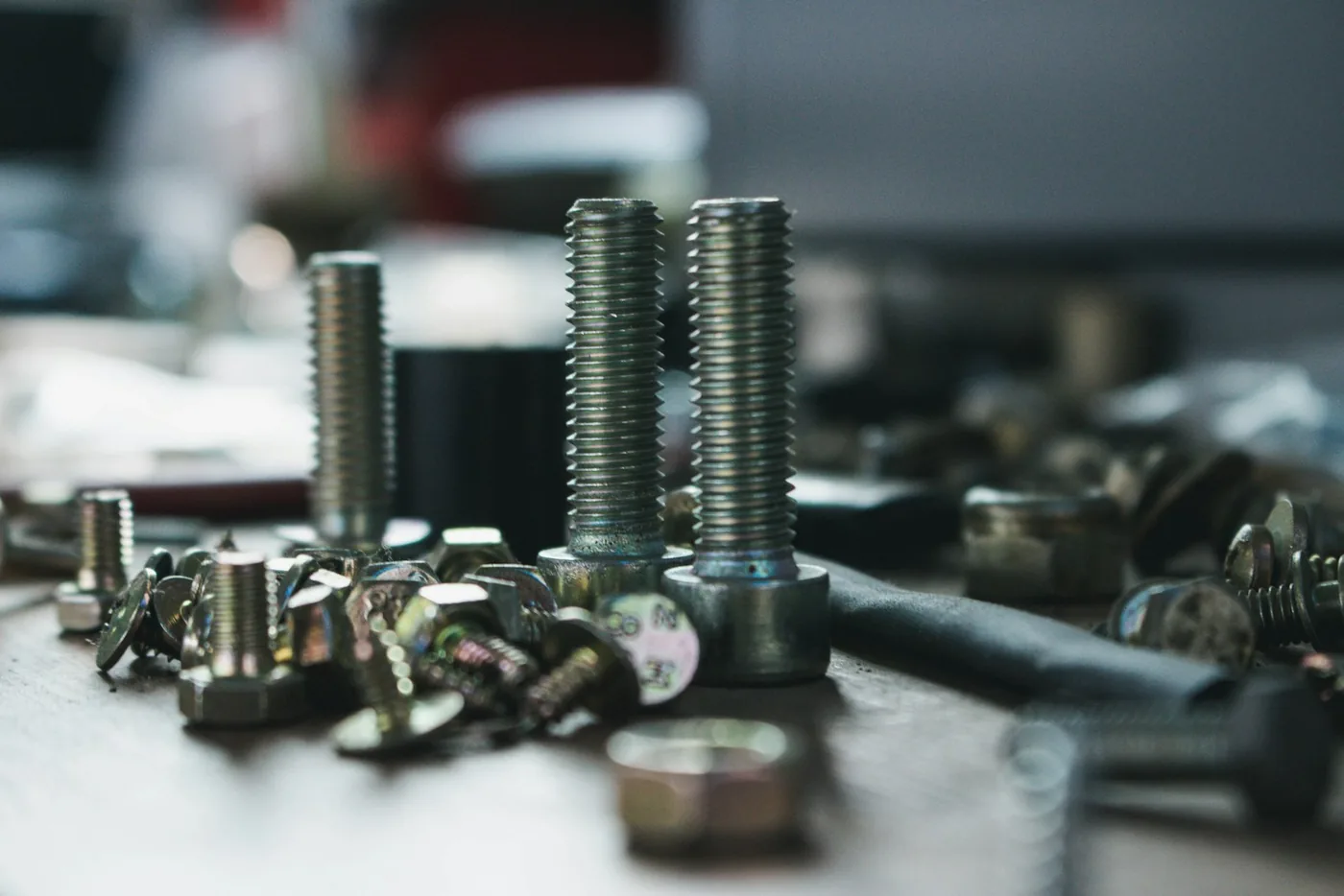 Steel bolts on a bench