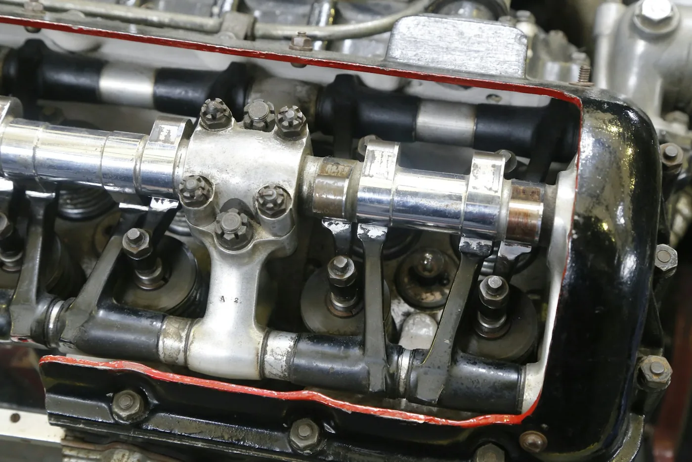 The top of an engine with its cam covers removed