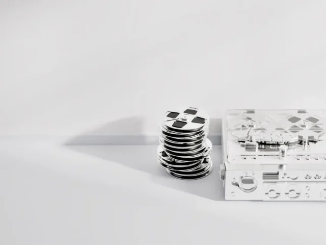 A stack of sealing rings beside a machined block
