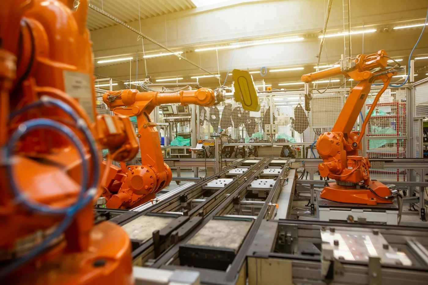 Robot arms on a factory production line
