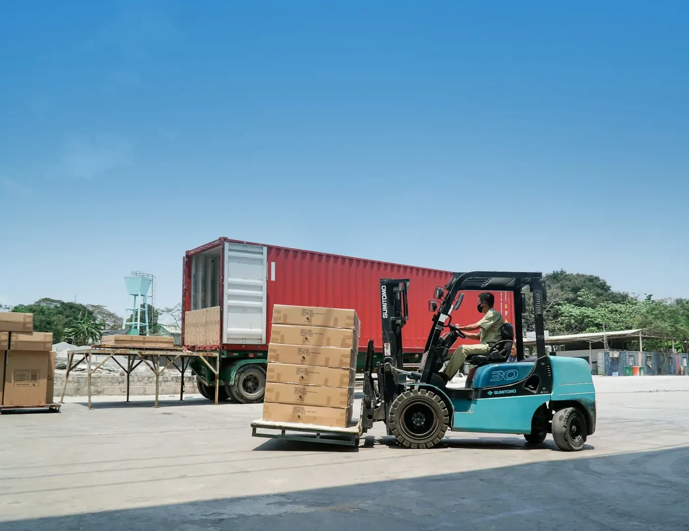 A forklift loading a truck