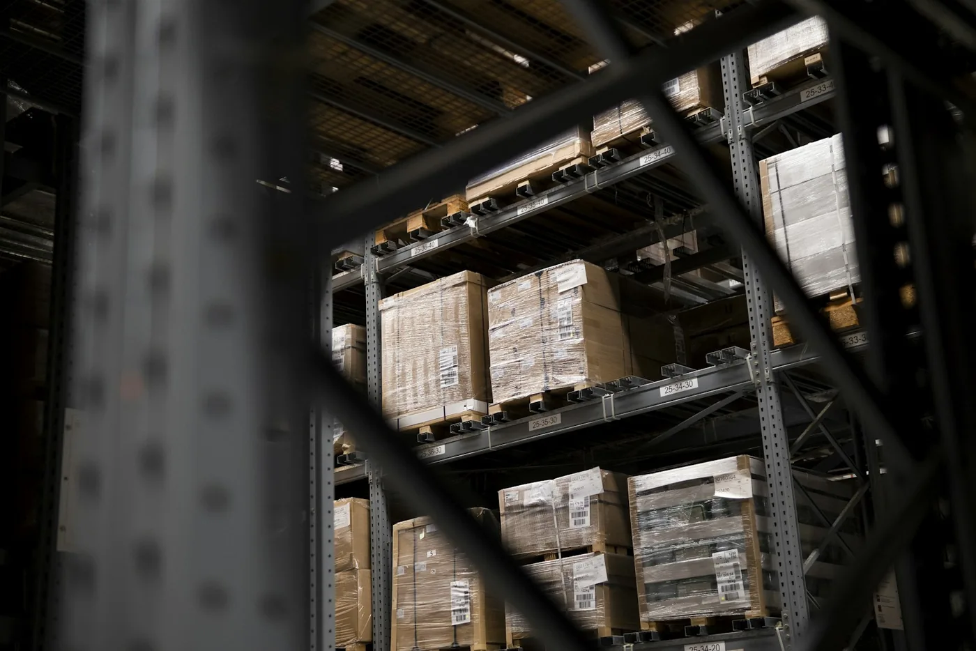 A warehouse filled with boxes and pallets