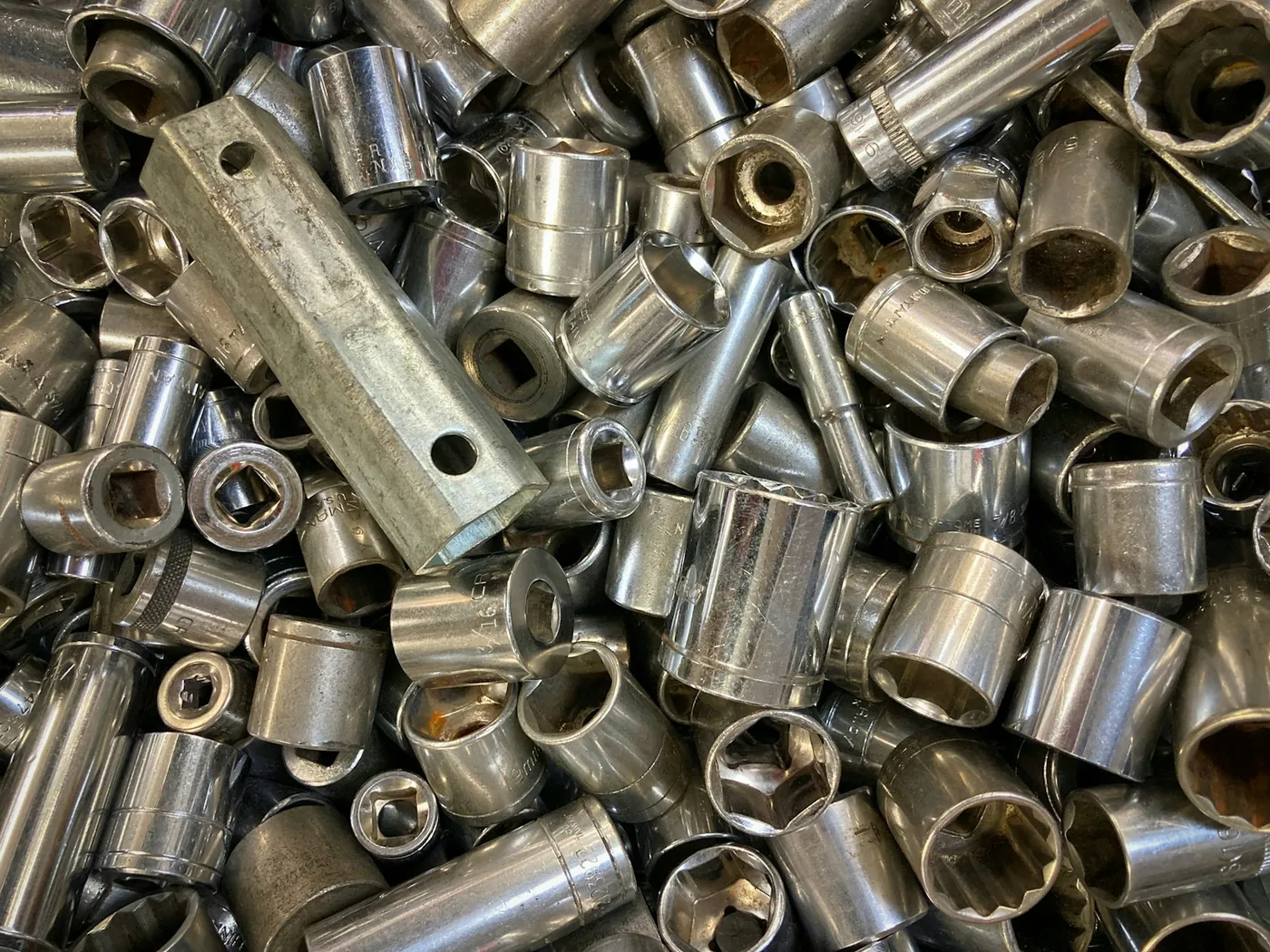 A heap of machined metal collars