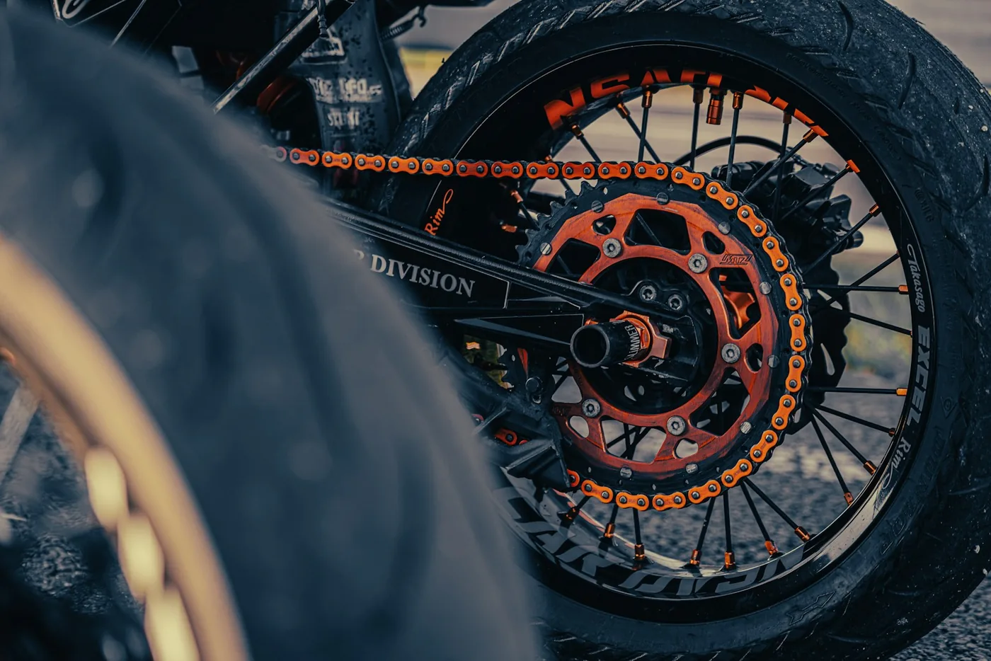 A sprocket and spokes on a motorcycle wheel