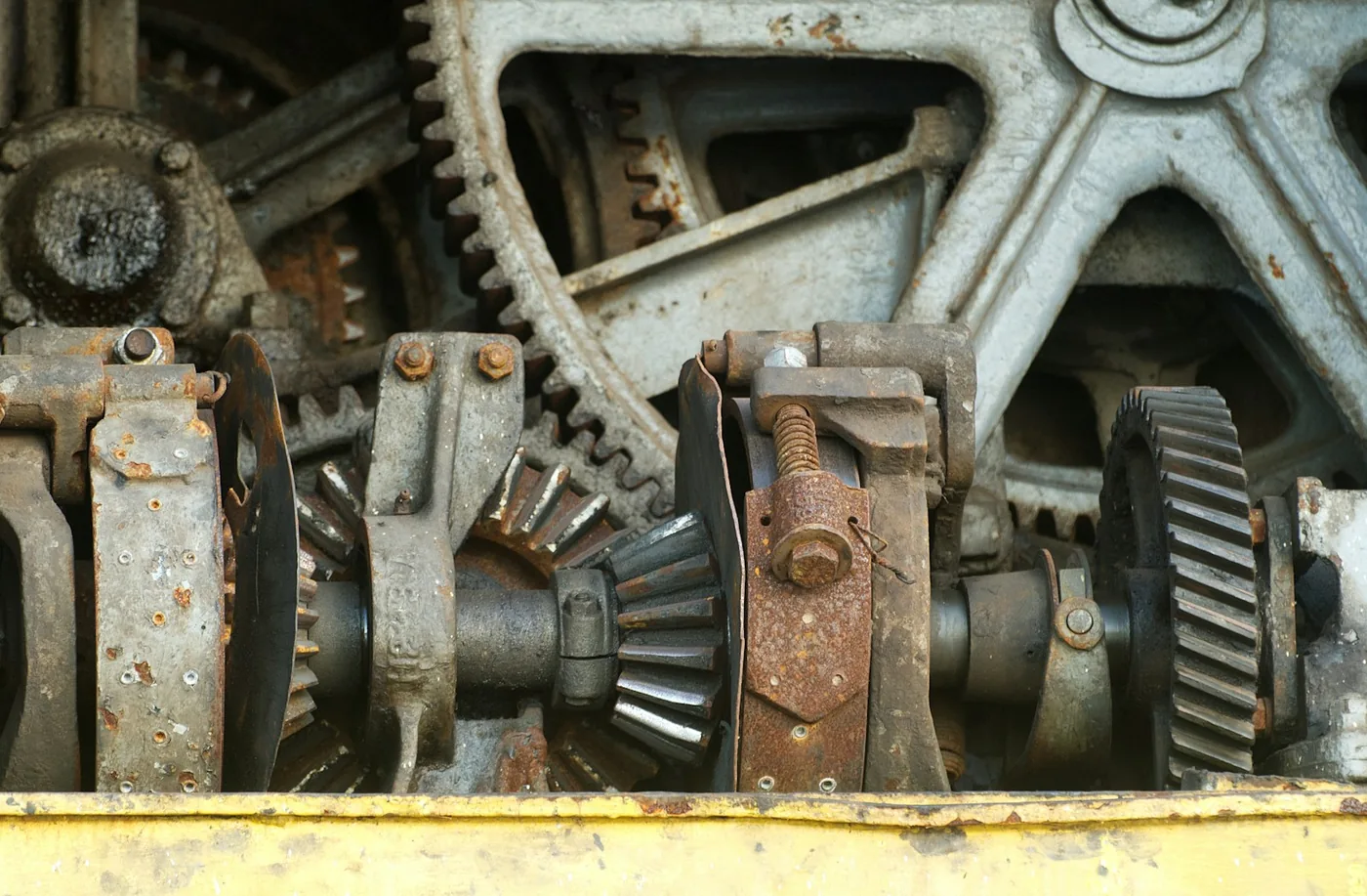 Worn teeth on a rusted gear