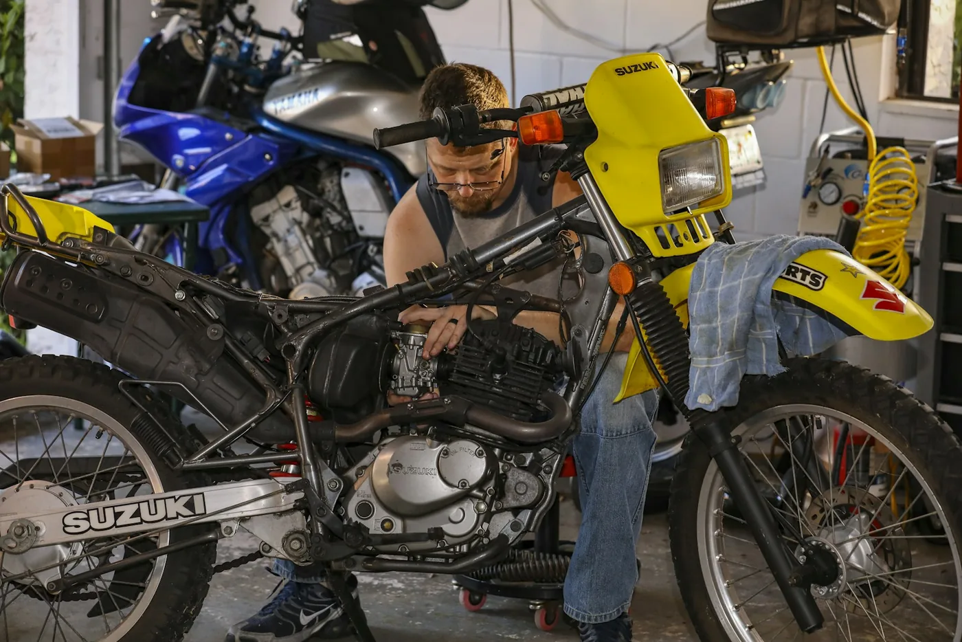 A person working on a motorcycle
