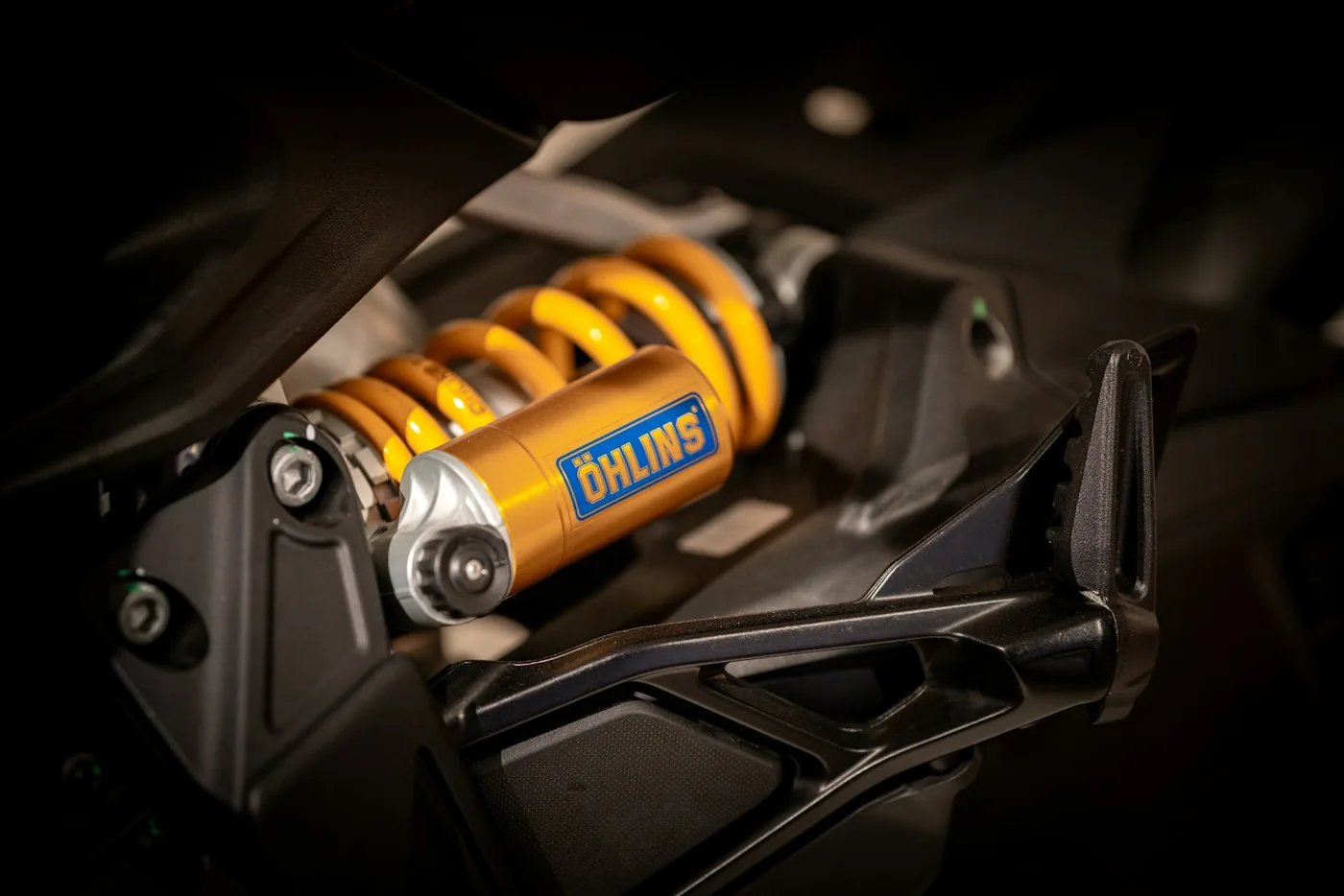 A rear shock absorber with a coil spring