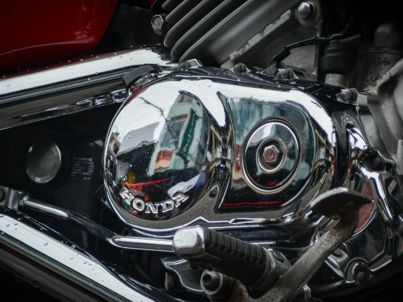 A polished chrome engine cover