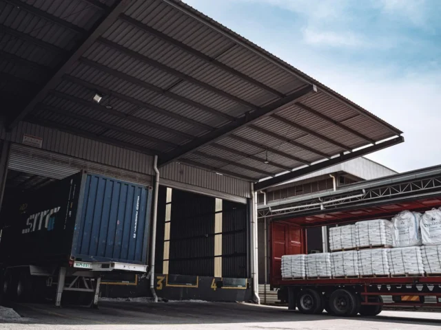 a semi truck is loaded with white bags