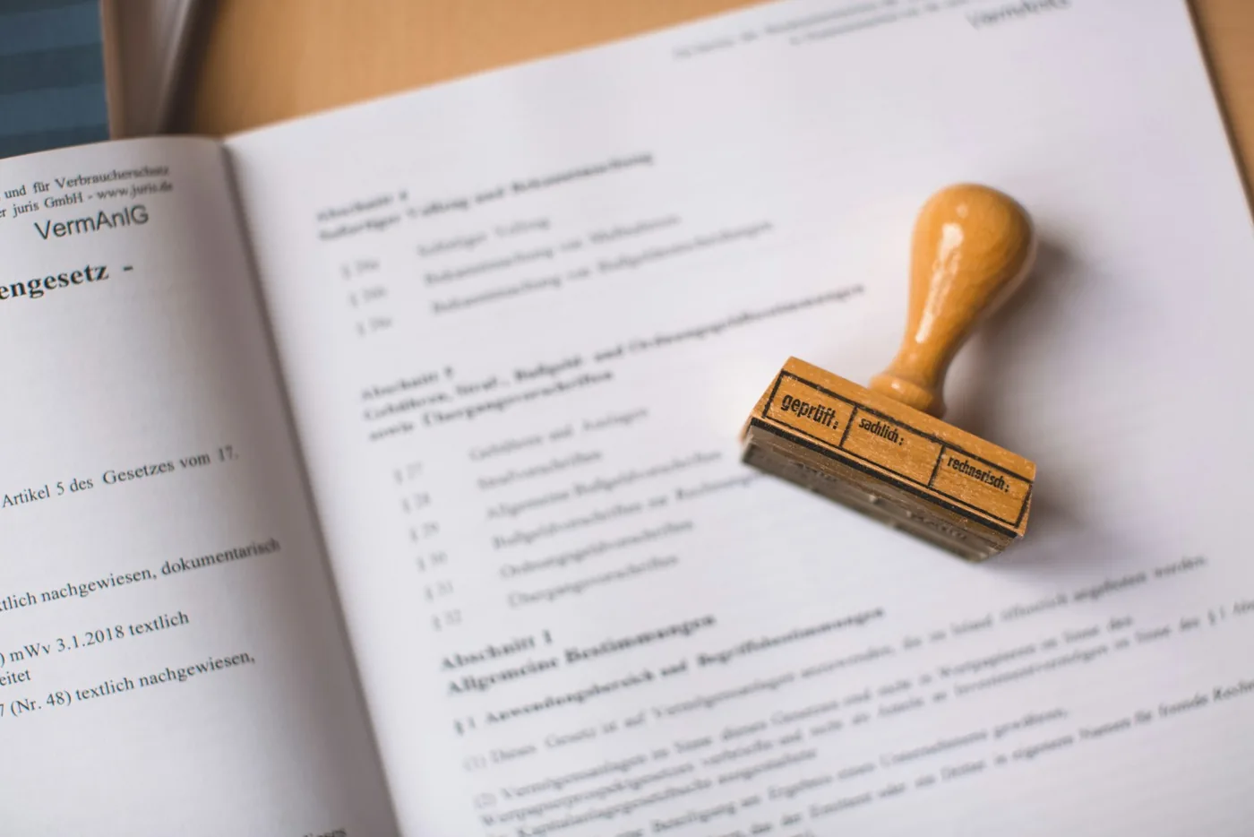 A rubber stamp resting on a printed document