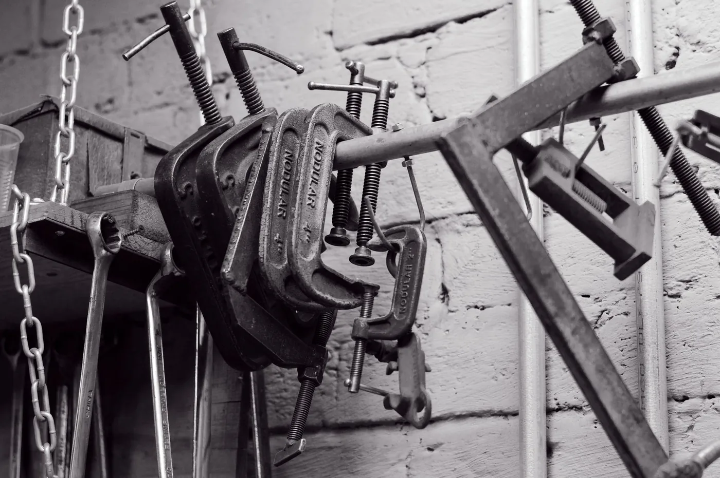 Metal clamps hanging in a workshop
