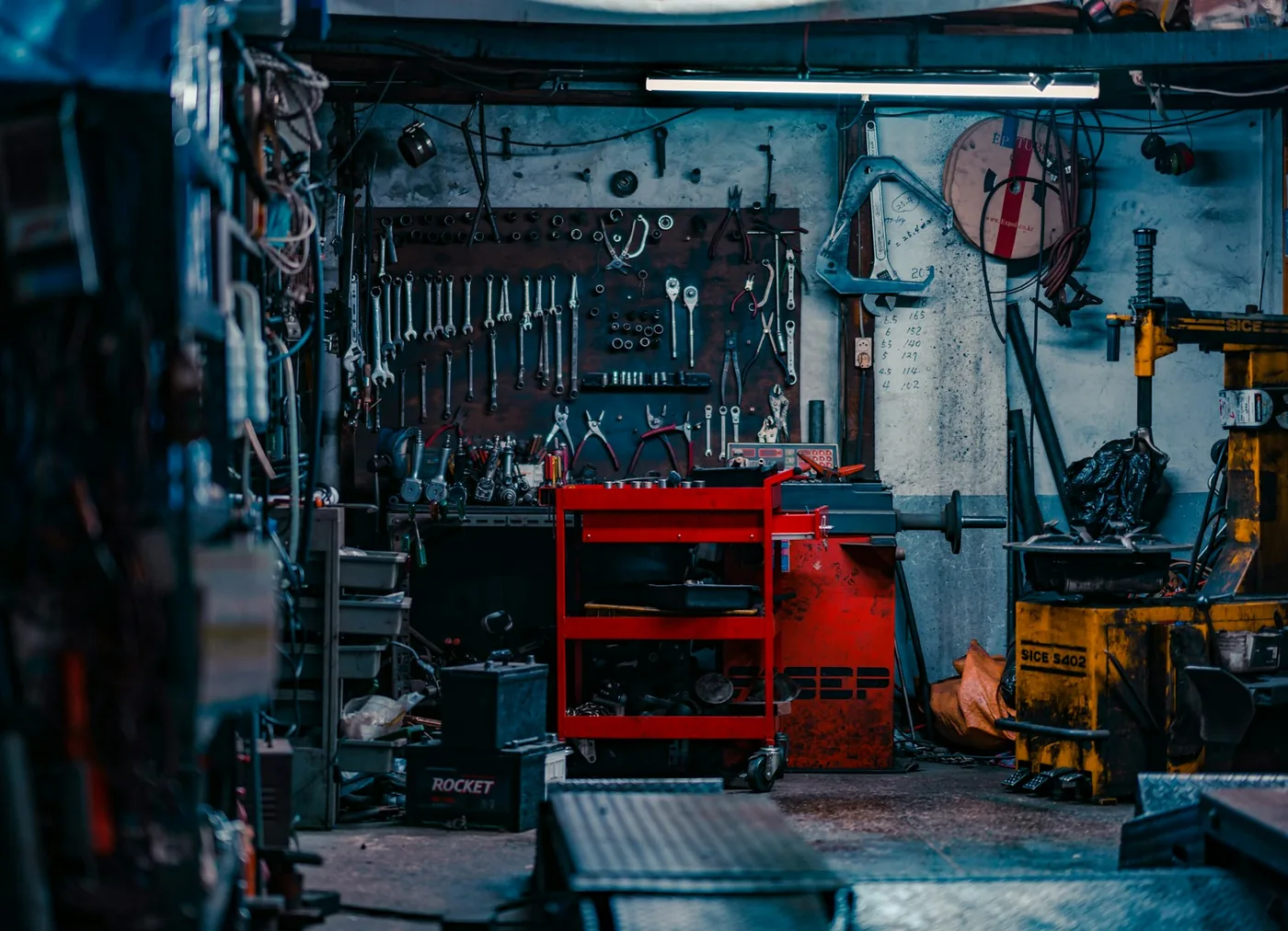 A workshop bench and tool cart