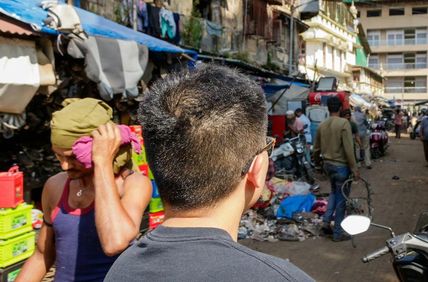 A busy street market with stalls